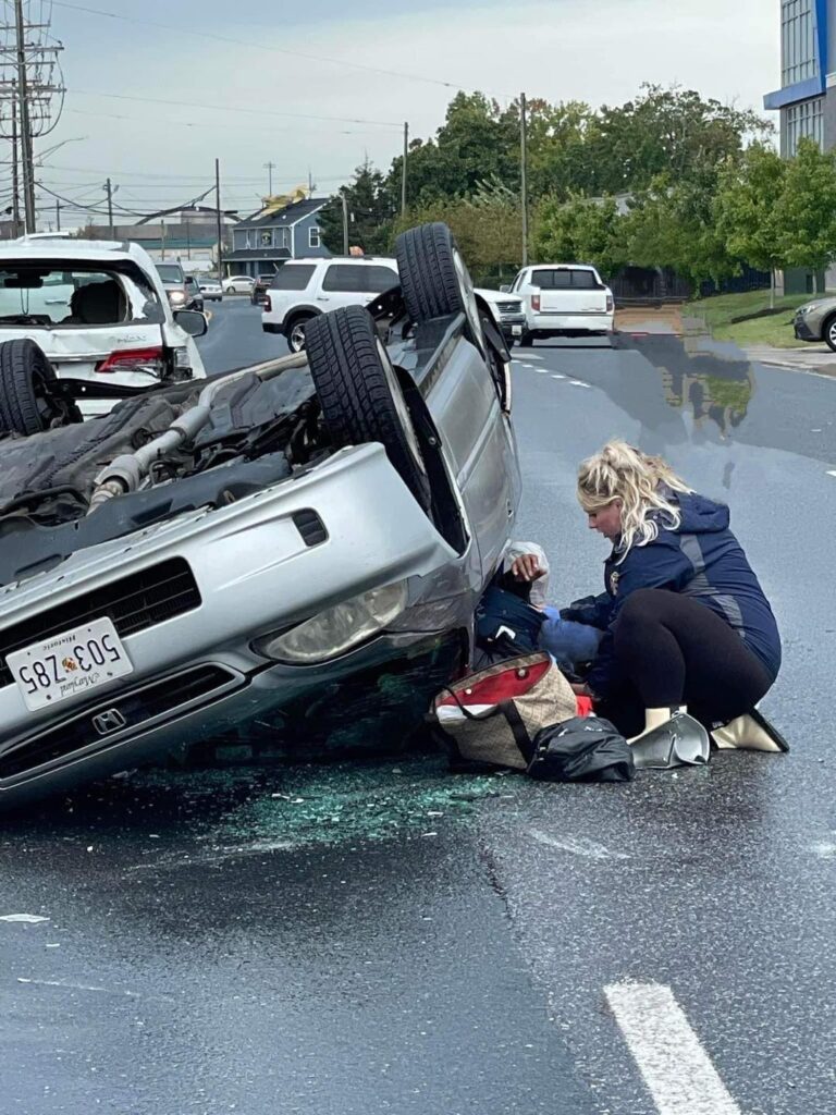 Megan Warfield assisting persons on accident scene 